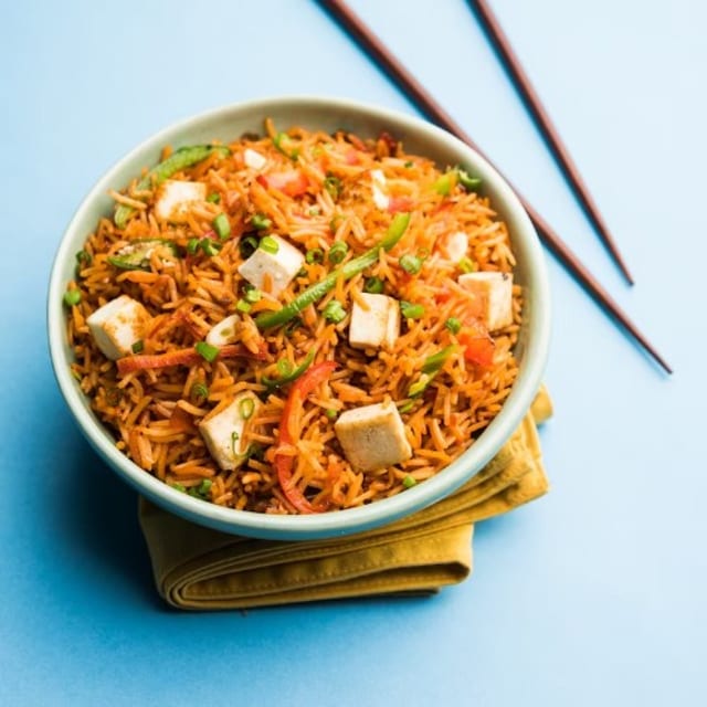 Schezwan Rice Paneer Chilli Gravy.