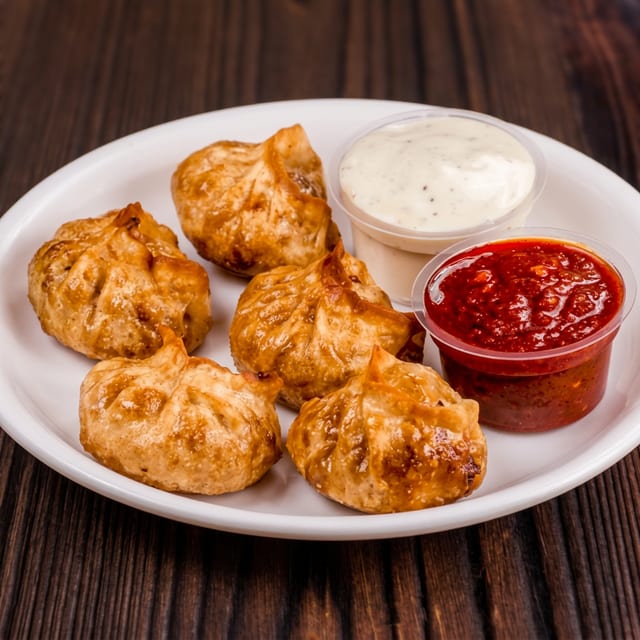 Chicken Tossed Kothe Momo.