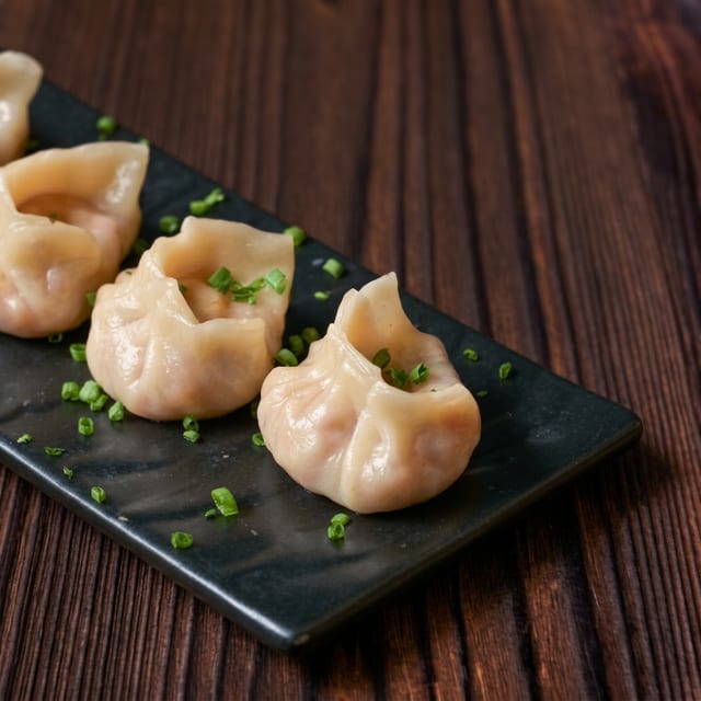 Paneer Tossed Chili Momo.